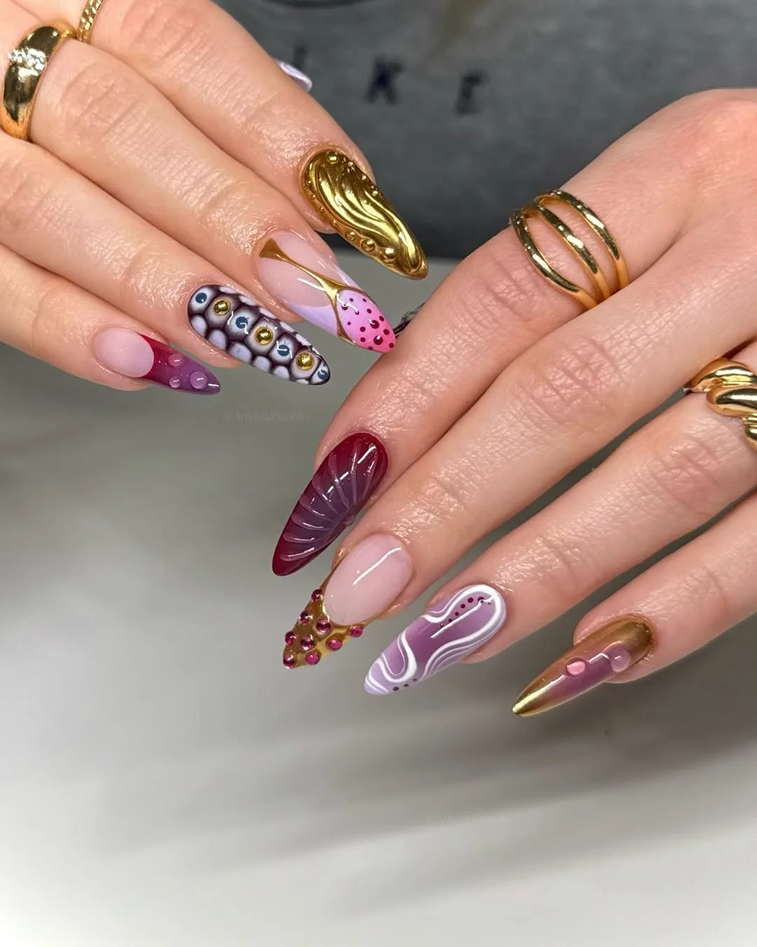 summer almond nails 2026 Modern Plum Art With Metallic Drama