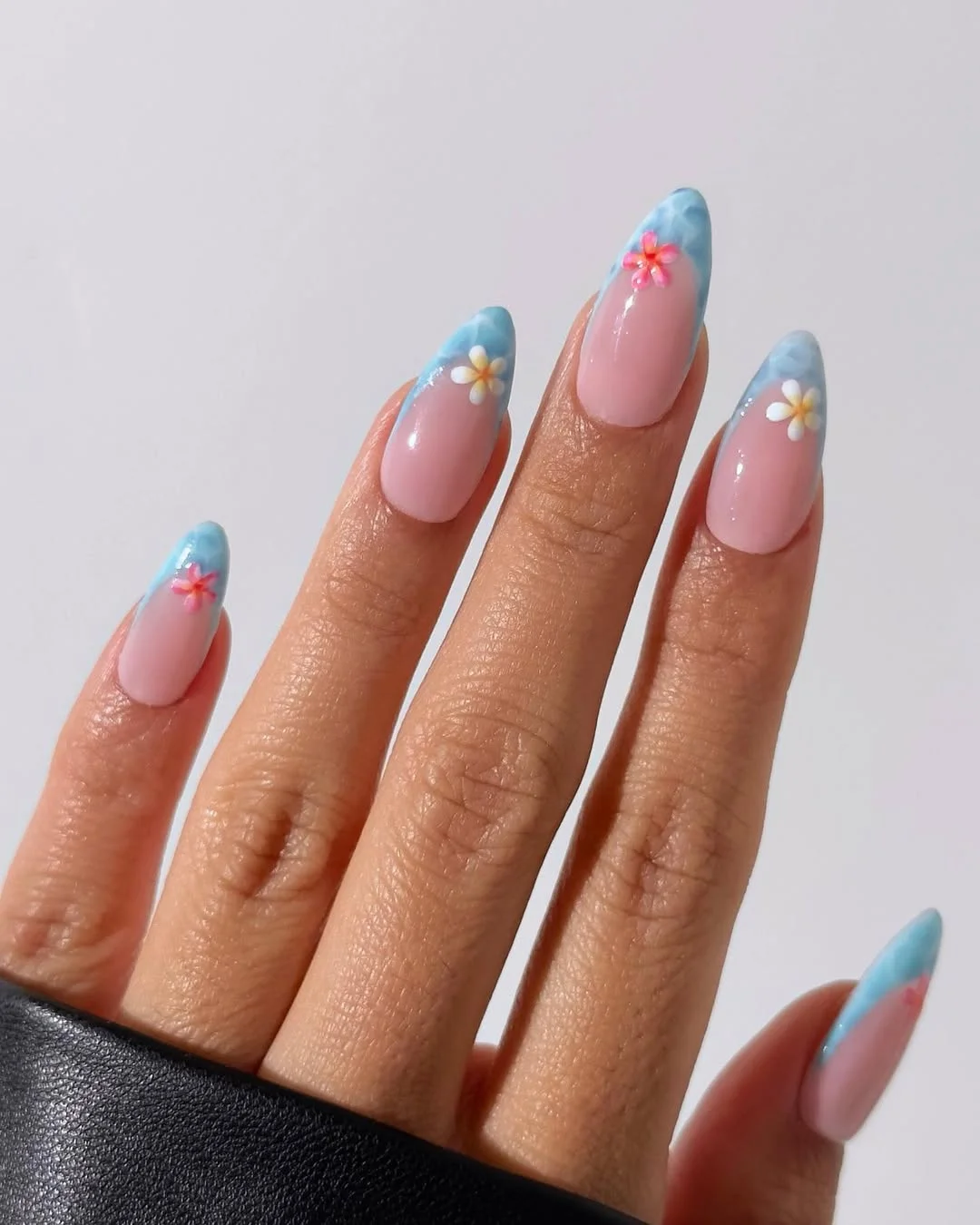 summer beach nails 2026 Blue Floral French Tips With Tropical Summer Vibes