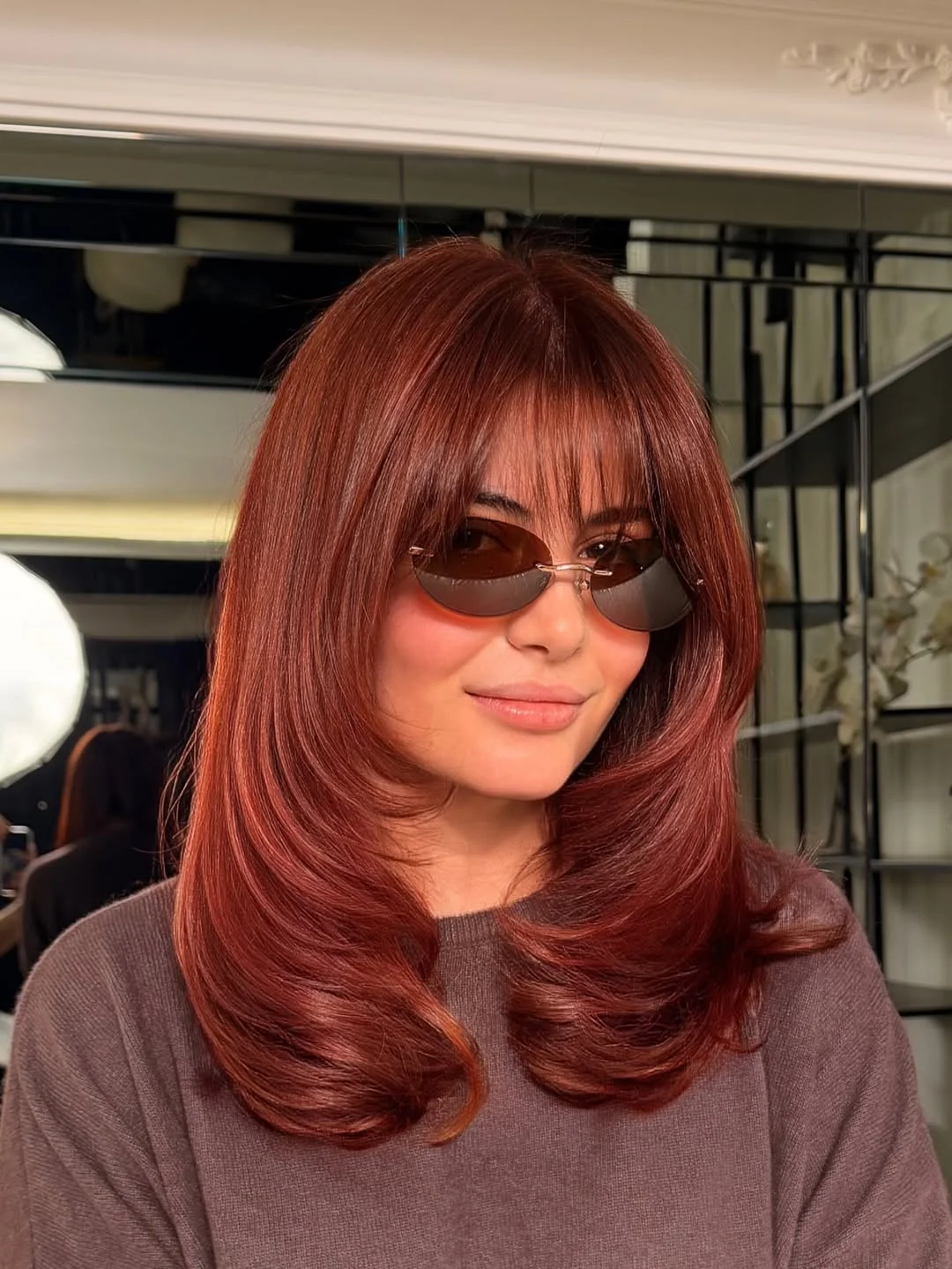 summer brunette hair color 2026 Soft Auburn Layers With Teddy Bear Warmth
