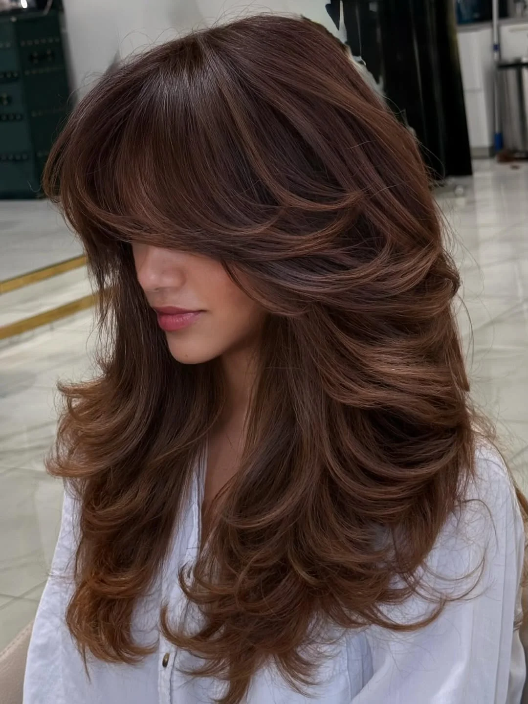 summer brunette hair color 2026 Chocolate Butterfly Layers With Volume