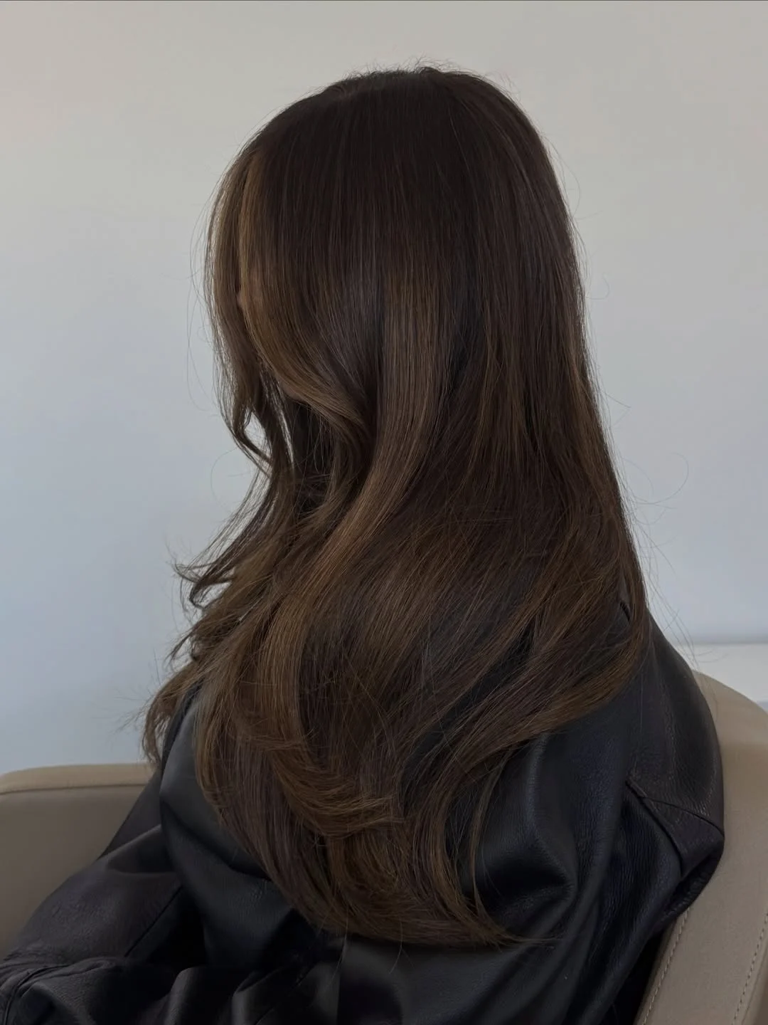 summer brunette hair color 2026 Cool Neutral Brunette With Soft Waves
