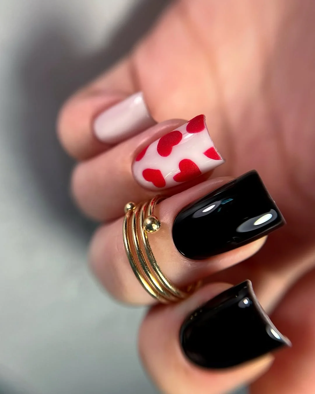 summer dip nails 2026 Black Gloss And Tiny Heart Accents
