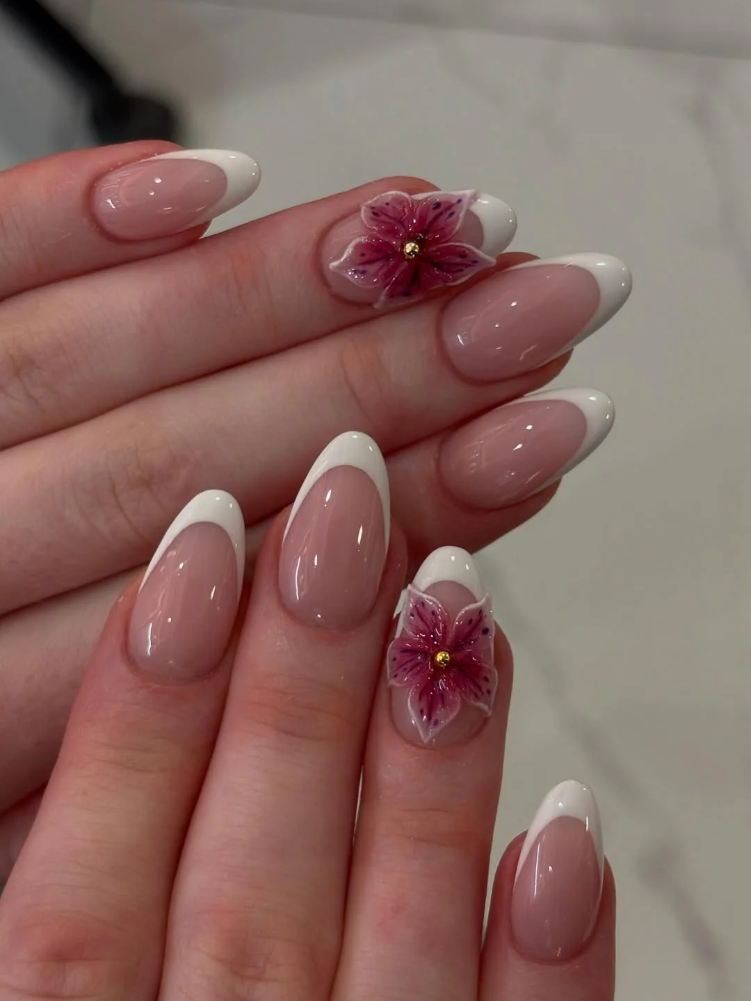 summer flower nails 2026 Minimal White French Nails With 3D Floral Accent
