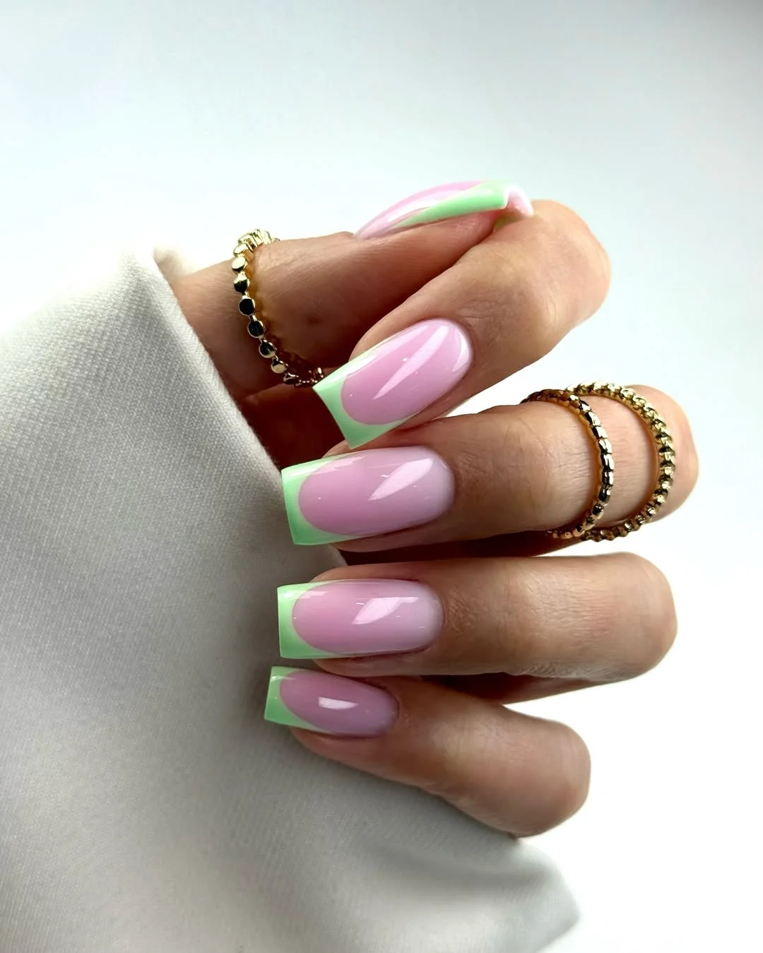 summer french nails ideas 2026 Pastel Green Square French Tips With Glossy Pink Base