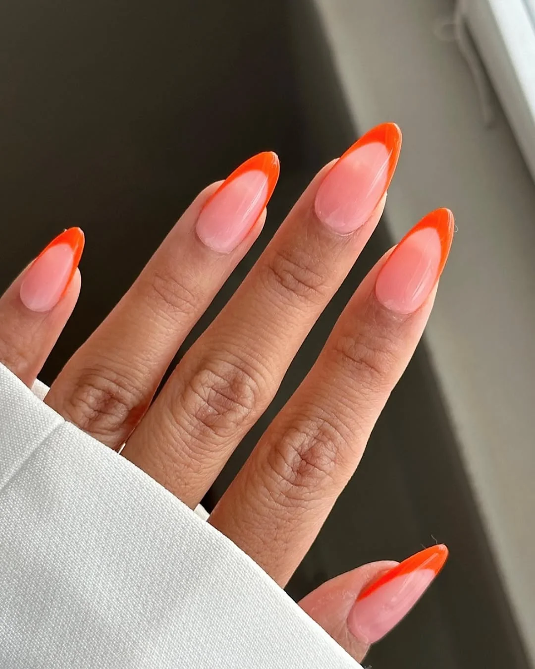summer french tip nails 2026 Glossy Orange French Tips For Hot Summer Days