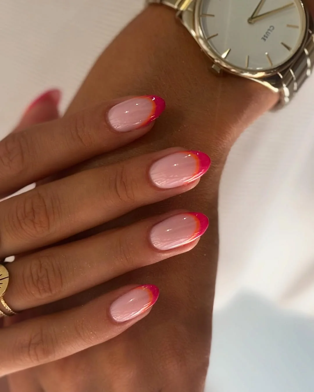 summer french tip nails 2026 Pink Sunset French Tips With a Glossy Fade