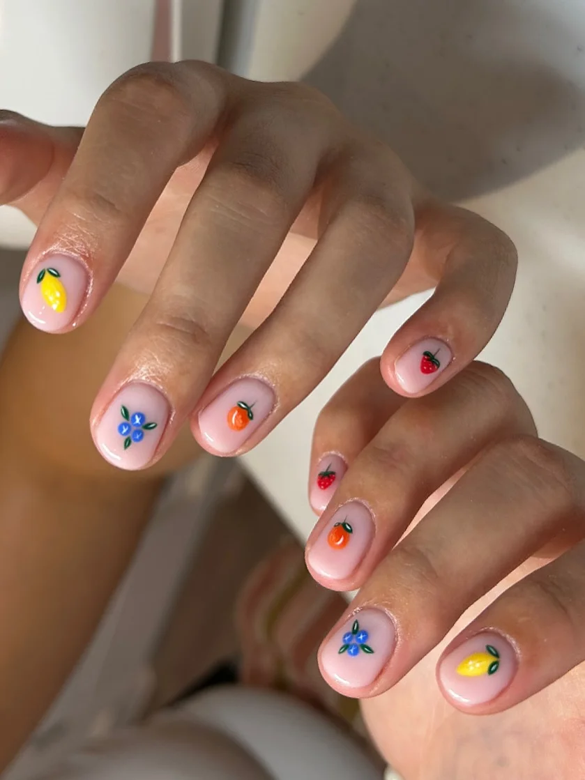 summer fruits nail art 2026 Minimal Fruit Stickers On Soft Pink Short Nails