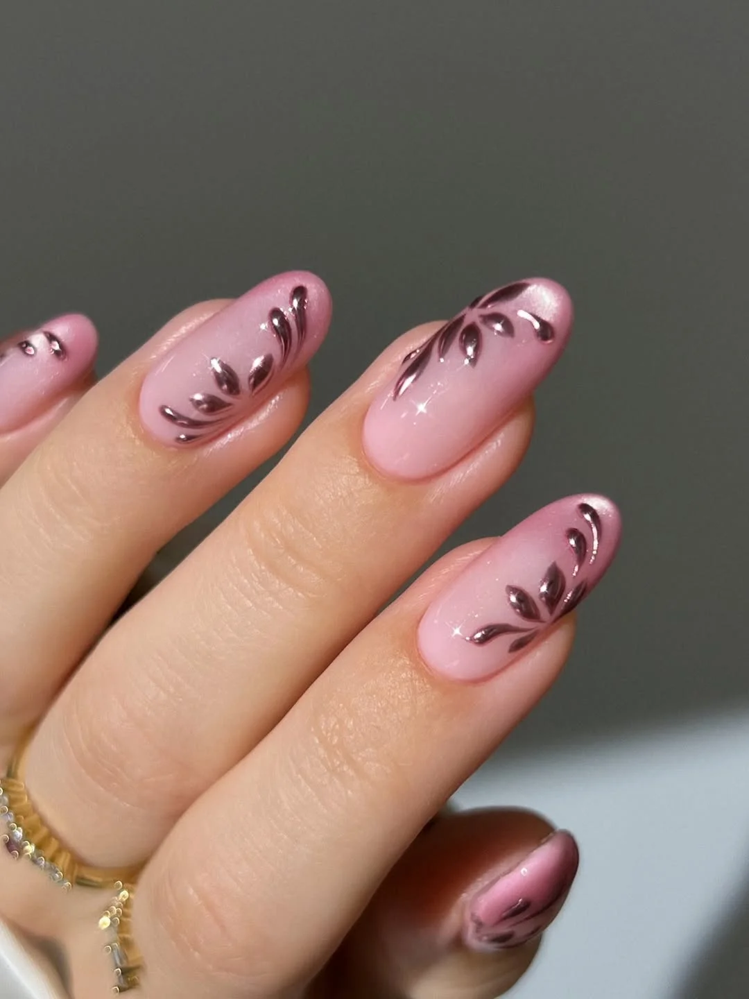 summer nail art ideas 2026 Soft Pink Botanical Nails With Glossy Chocolate Details