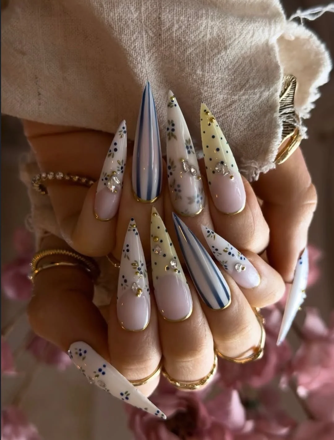 summer nail inspo 2026 Elegant Blue Floral Stiletto Nails