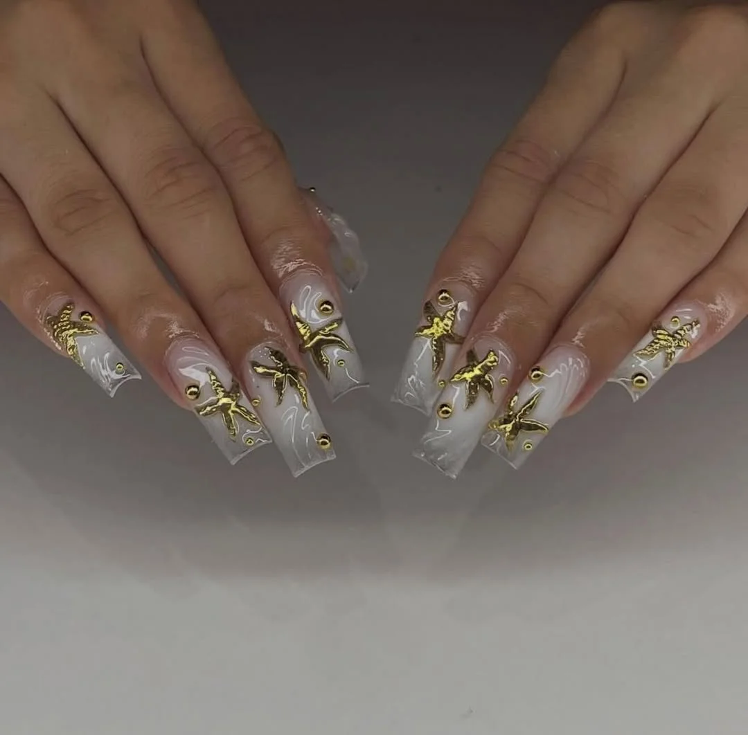 summer nails ballerina shape 2026 White Marble And Gold Butterfly Glam