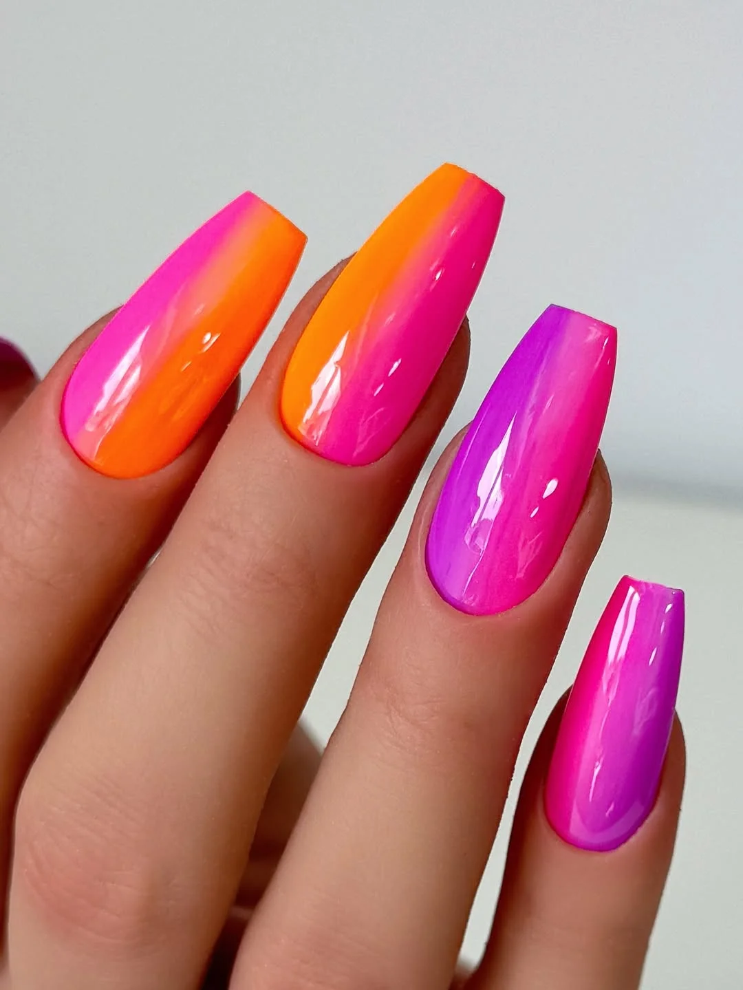 summer ombre nails 2026 Bright Neon Ombre with Pink and Orange Fade