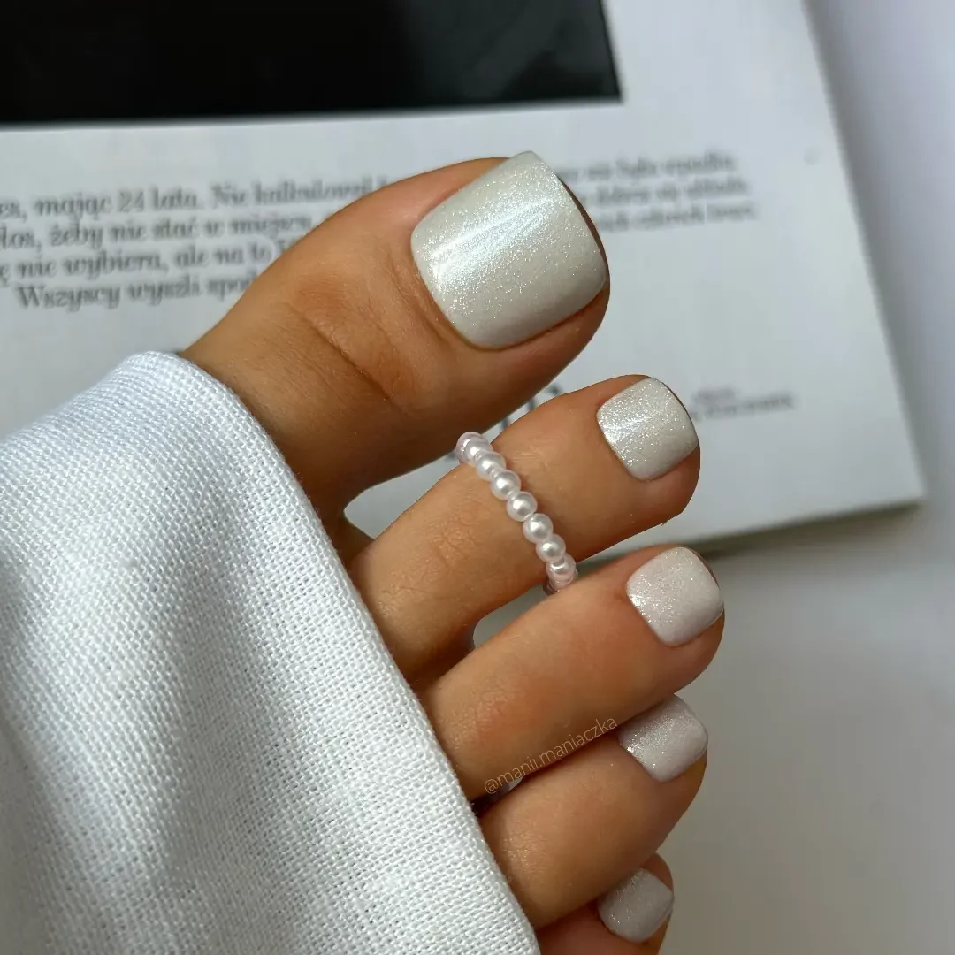 summer pedicure colors 2026 Pearl White Pedicure With a Glazed Finish