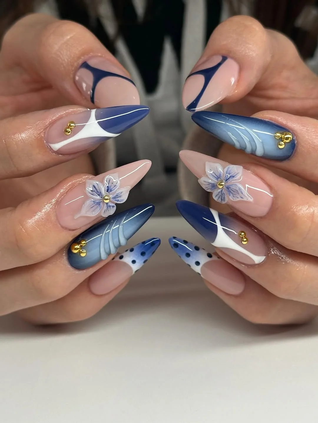 summer stiletto nails 2026 Blue Botanical Elegance with Modern Stiletto Details