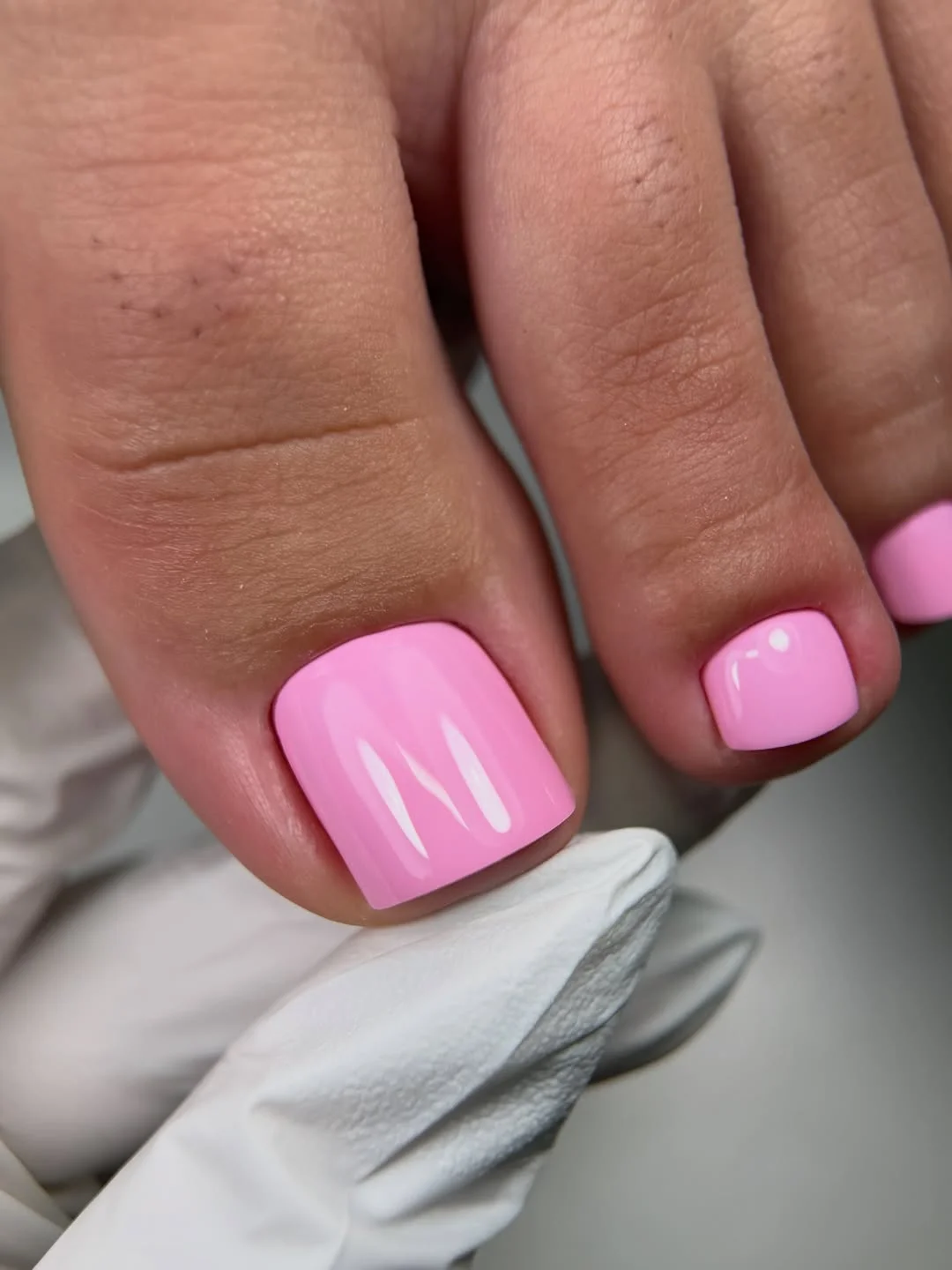 summer toe nails colors 2026 Glossy Candy Pink Pedicure