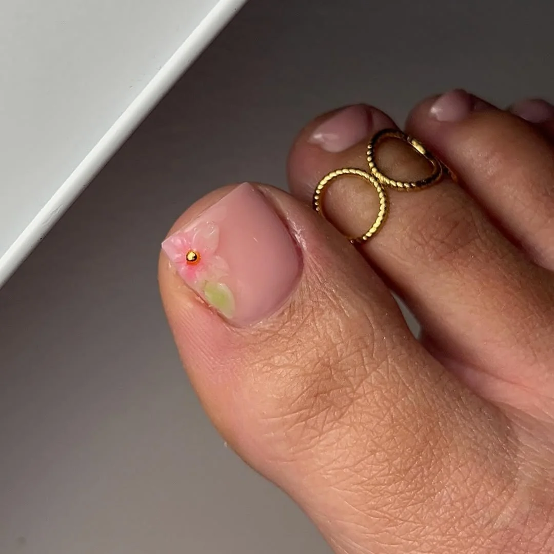 summer toe nails colors 2026 Soft Blossom Nude Pedicure