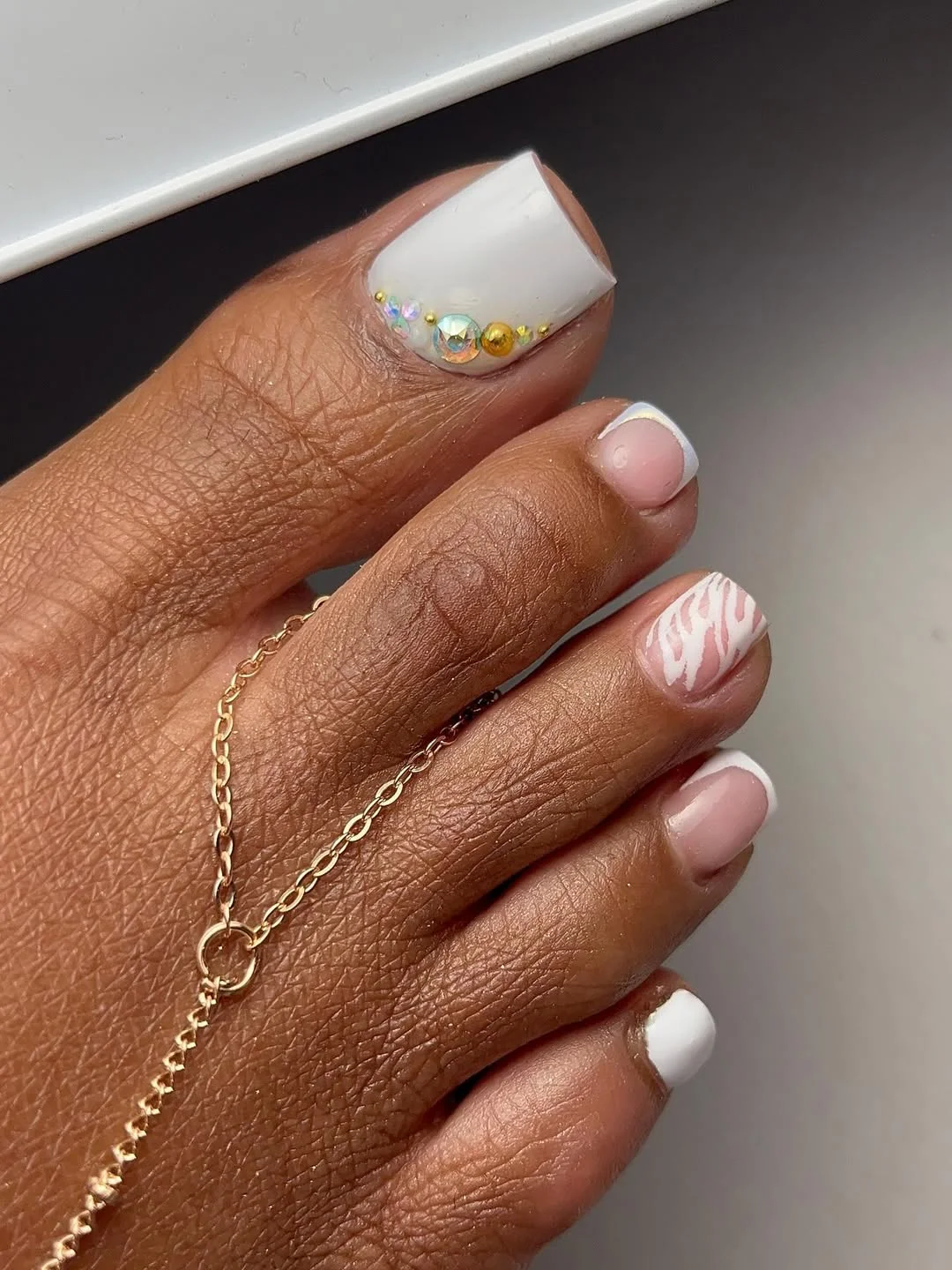 summer toe nails colors 2026 White Zebra French Pedicure