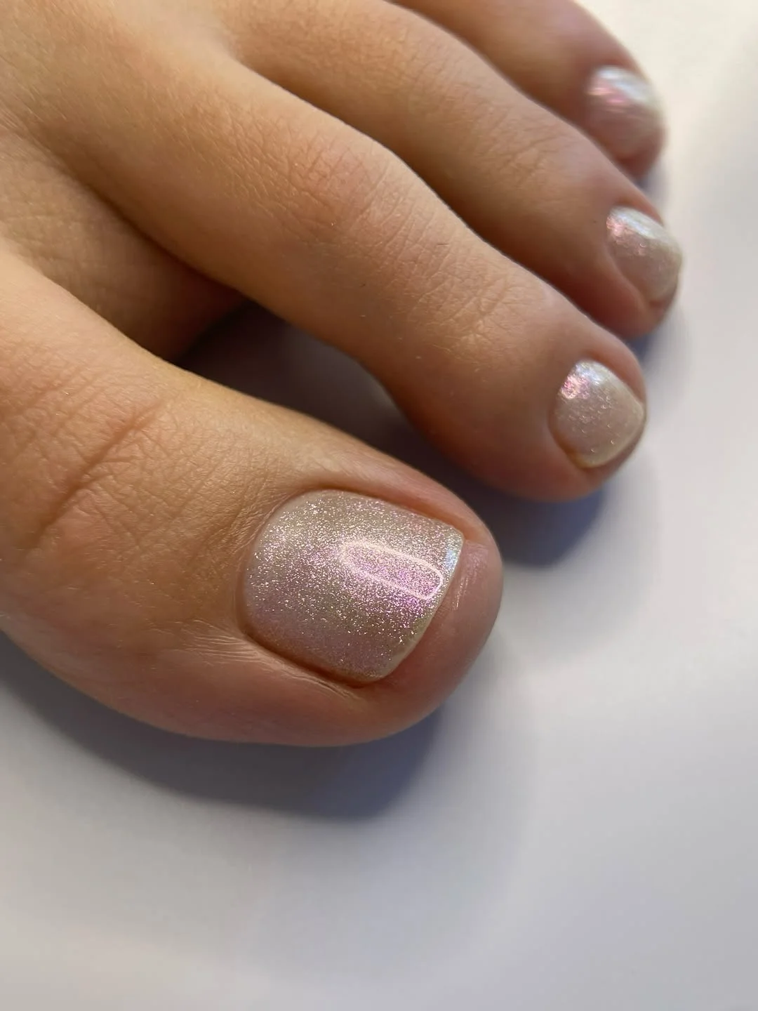 summer toe nails colors 2026 Glazed Pearl Shimmer Pedicure