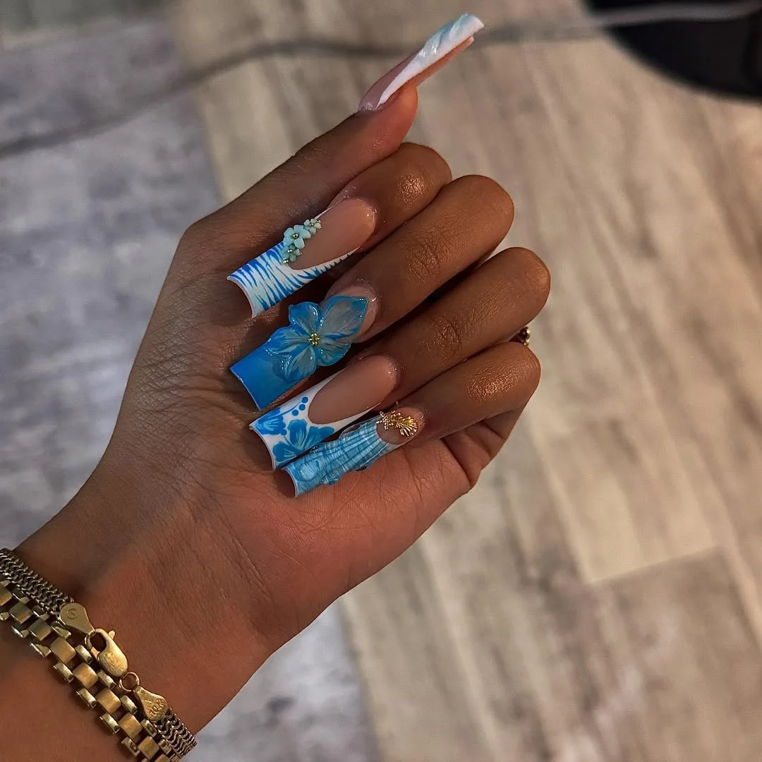 summer vibrant nails summer 2026 Blue Floral Summer Nails With Ocean Inspired Details