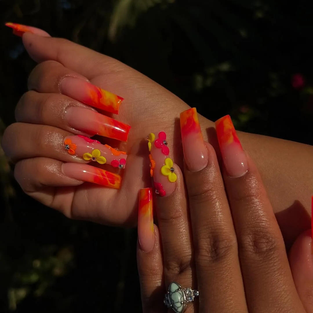 summer vibrant nails summer 2026 Bright Sunset Ombre Nails With Neon Flowers