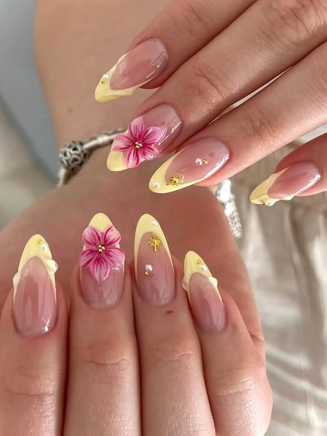 summer yellow nails 2026 Butter Yellow Floral Nails With Tropical Pink Accents