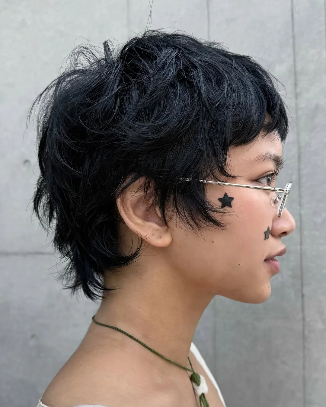 textured summer bixie haircut 2026 Choppy Noir Bixie with Spiky Energy