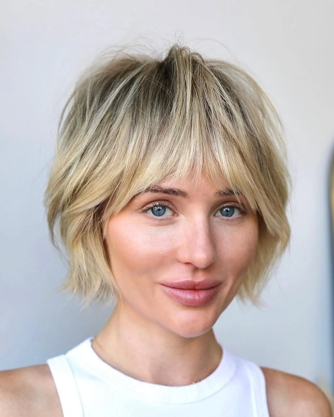 textured summer bixie haircut 2026 Choppy platinum bixie with airy volume