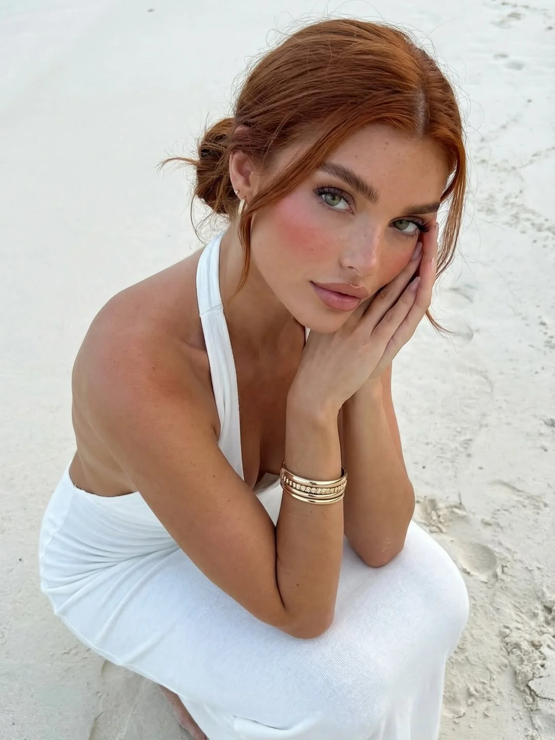 trendy summer hairstyles ideas 2026 Low Romantic Bun Auburn Tendrils
