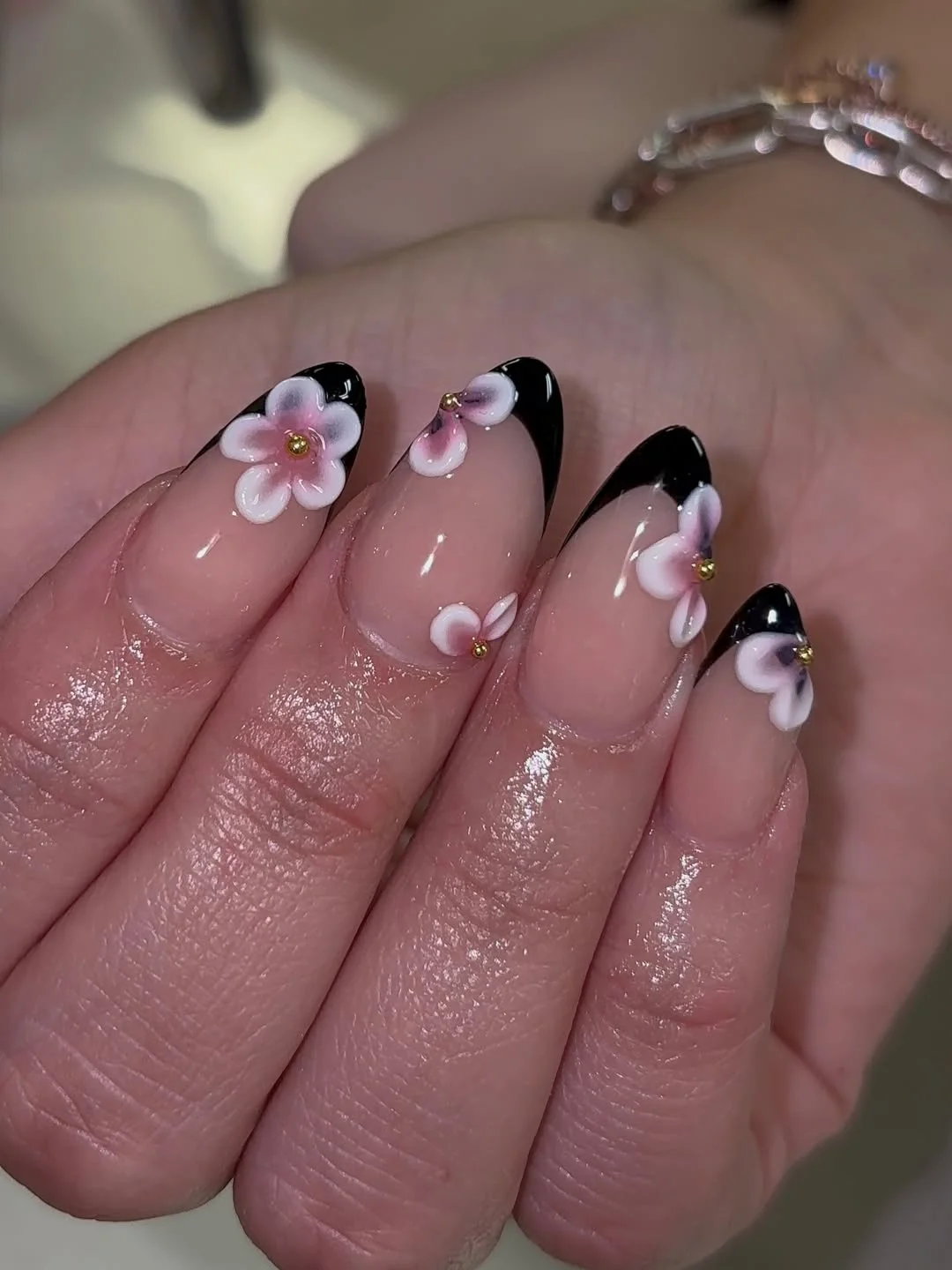 trendy summer nails 2026 Black French Tips With 3D Flowers