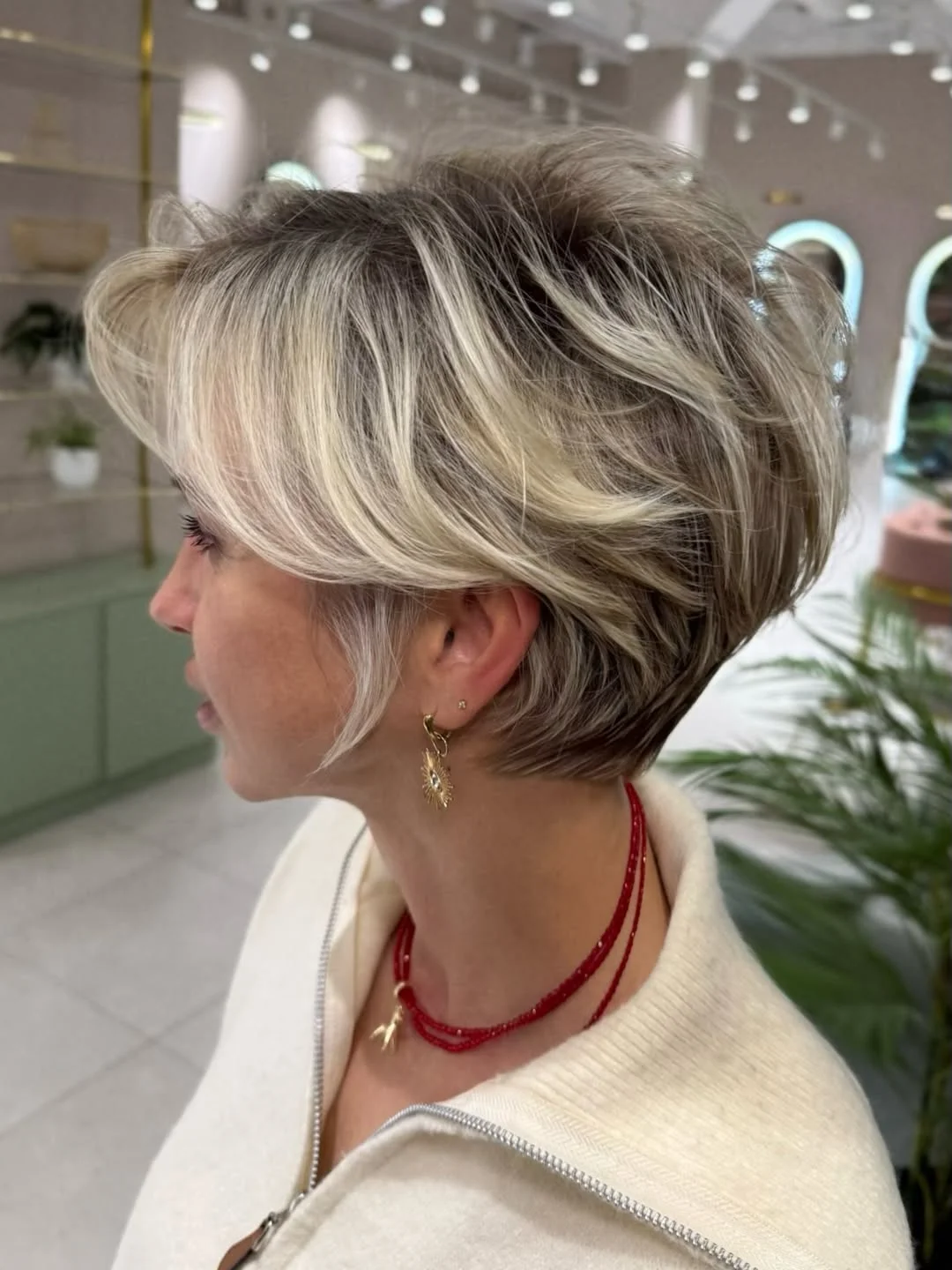youthful summer haircuts for women over 50 2026 Feathered Short Shag With Volume and Dimension