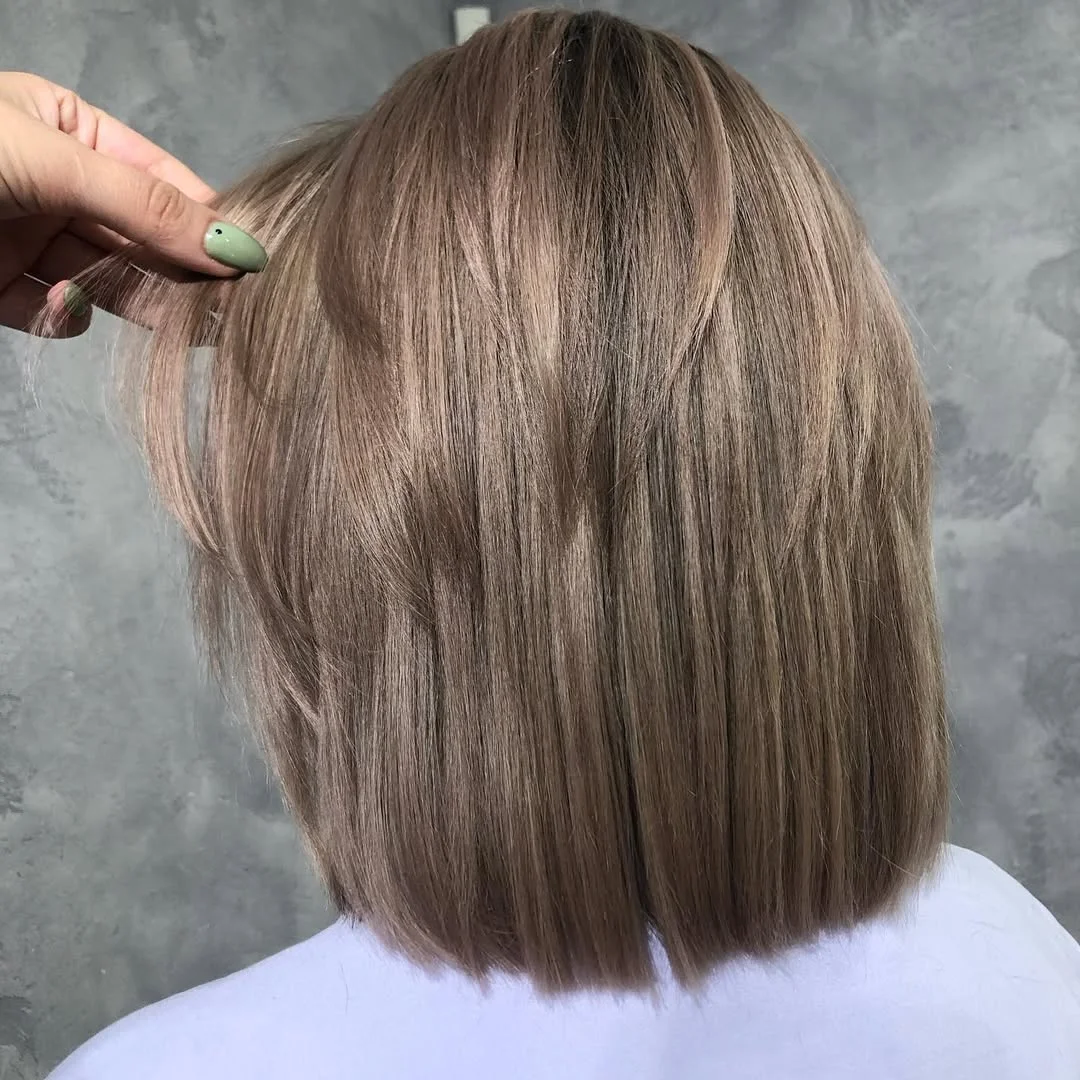 youthful summer haircuts for women over 50 2026 Sleek Blunt Bob With Natural Shine