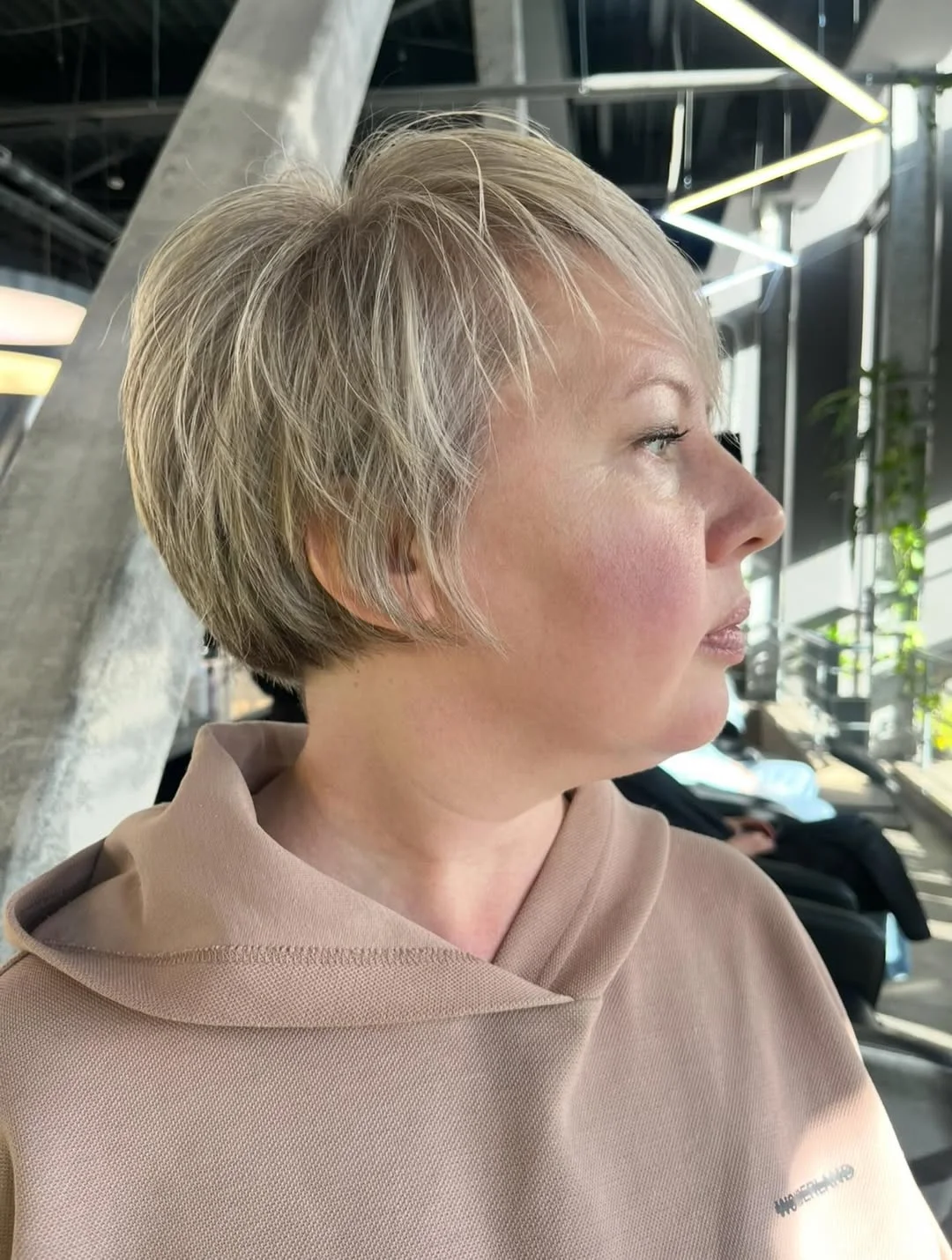 youthful summer haircuts for women over 50 2026 Feathered Pixie with Soft Volume