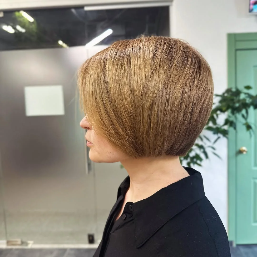 youthful summer haircuts for women over 50 2026 Classic Stacked Bob with Sculpted Back