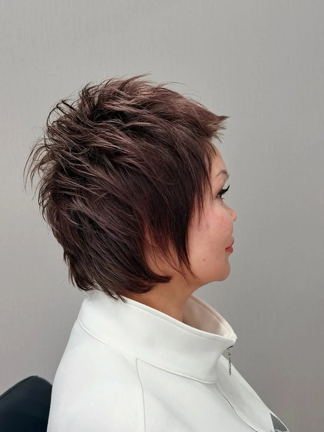 youthful summer haircuts for women over 50 2026 Textured Short Shag with Edgy Volume