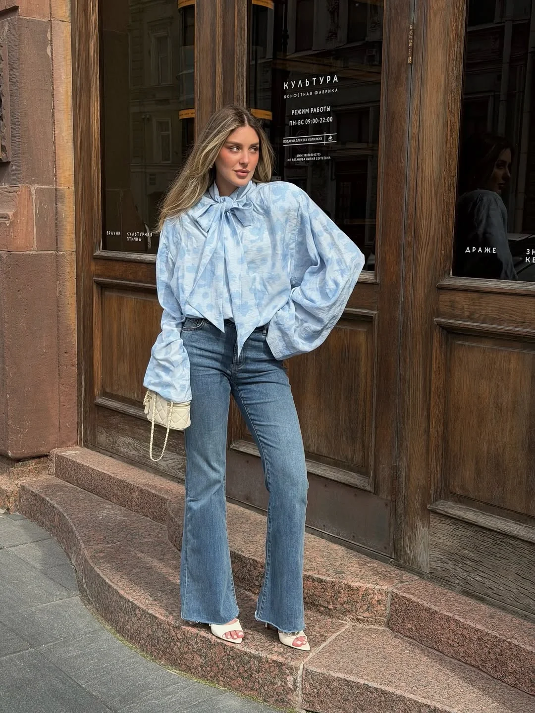 comfy fall outfits 2026 Soft Blue Blouse And Flared Denim For Effortless Fall Days