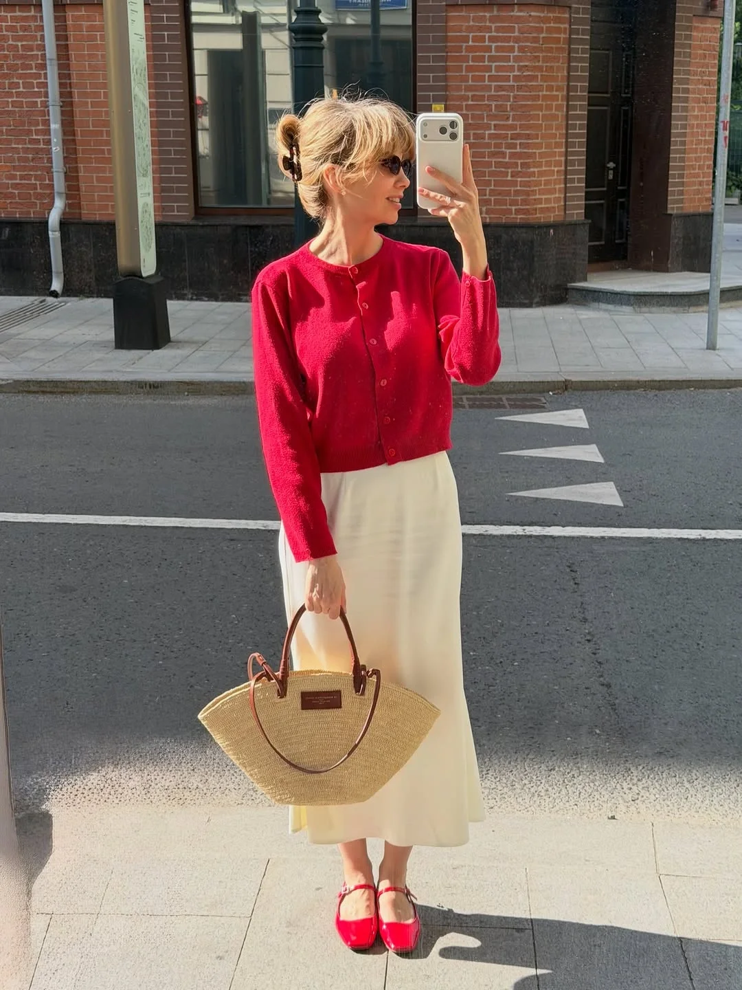 comfy fall outfits 2026 The Red Cardigan And Cream Skirt For Sunny Fall Days
