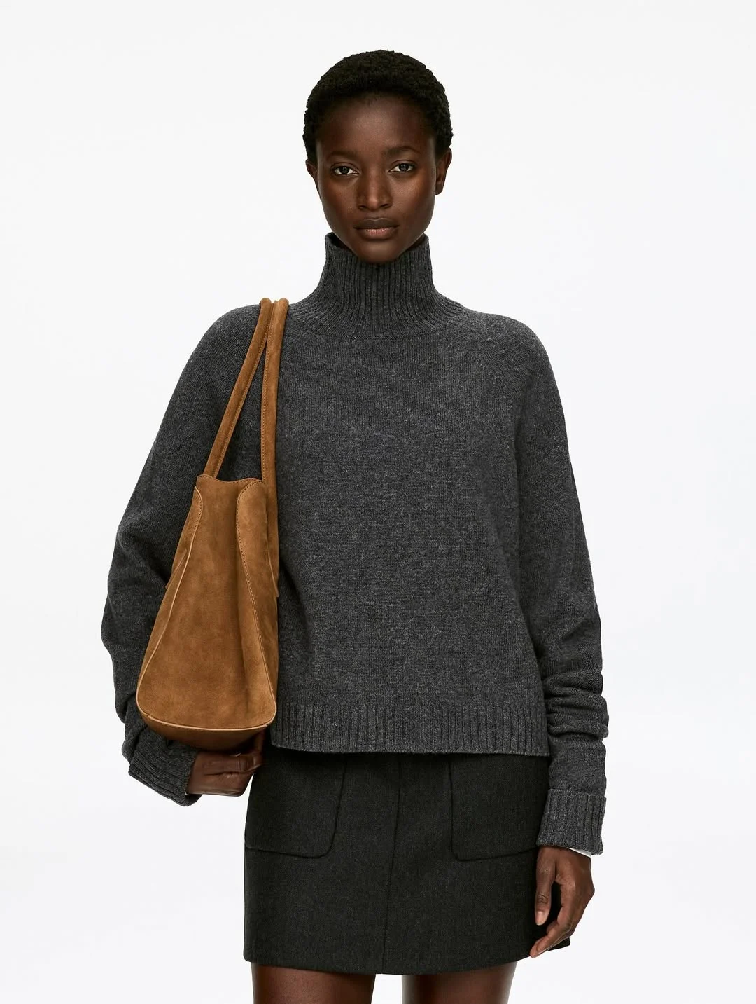 cozy chic fall outfits for 2026 Minimalist Charcoal Sweater and Mini Skirt