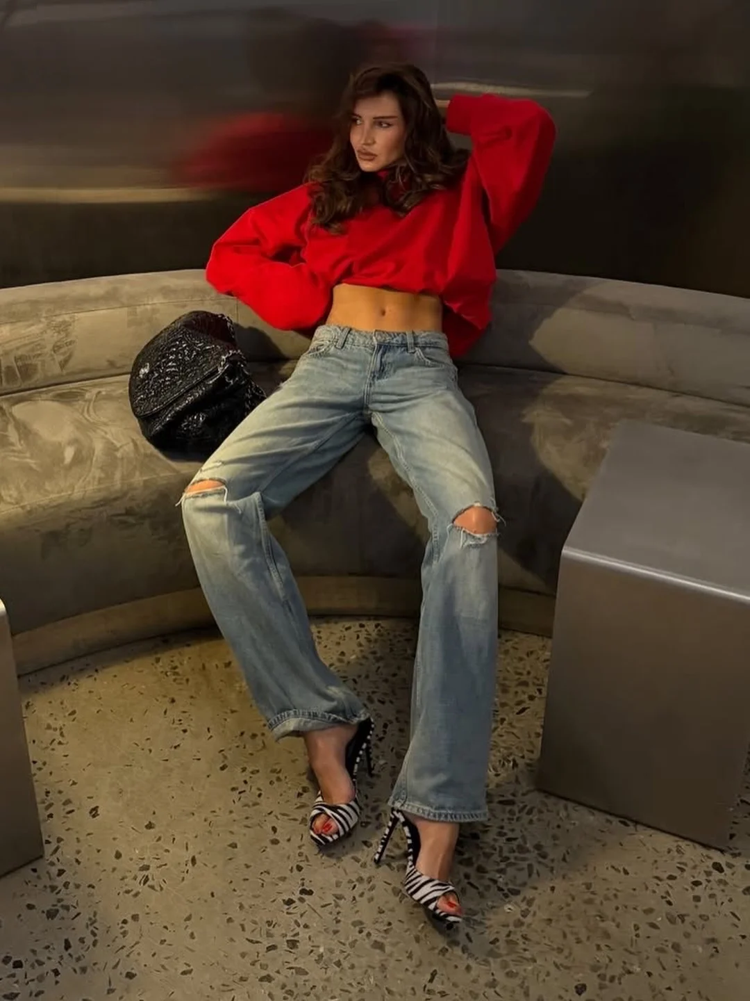 early fall outfits ideas 2026 Bold Red Sweatshirt and Relaxed Denim Energy
