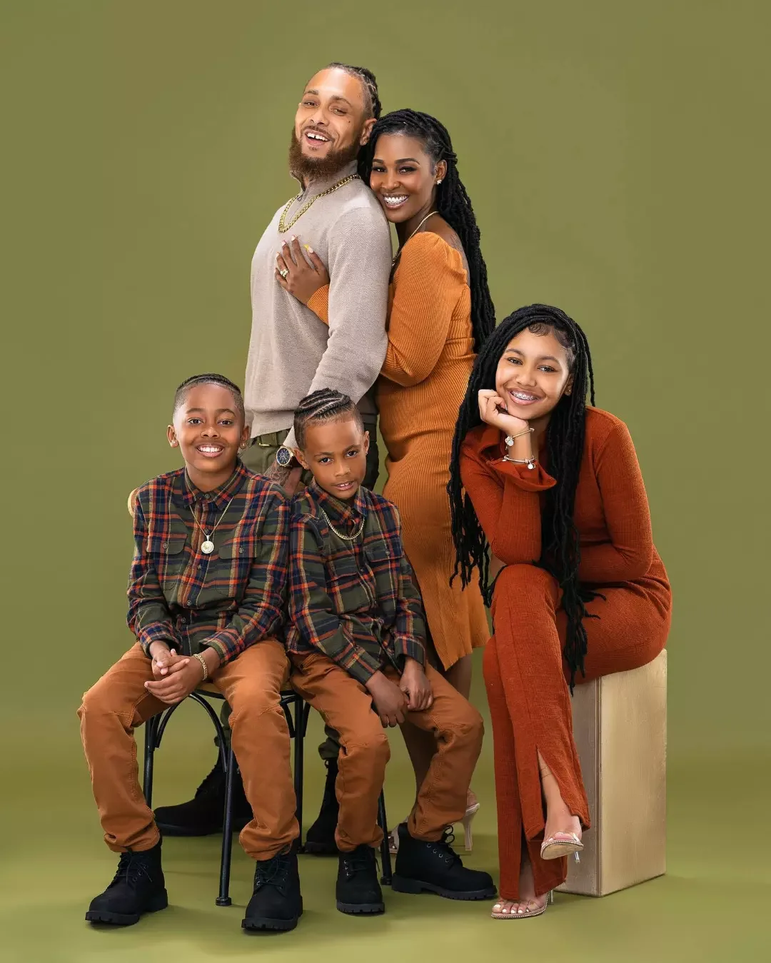 fall family picture outfits 2026 Warm Earth Tones For A Coordinated Family Portrait