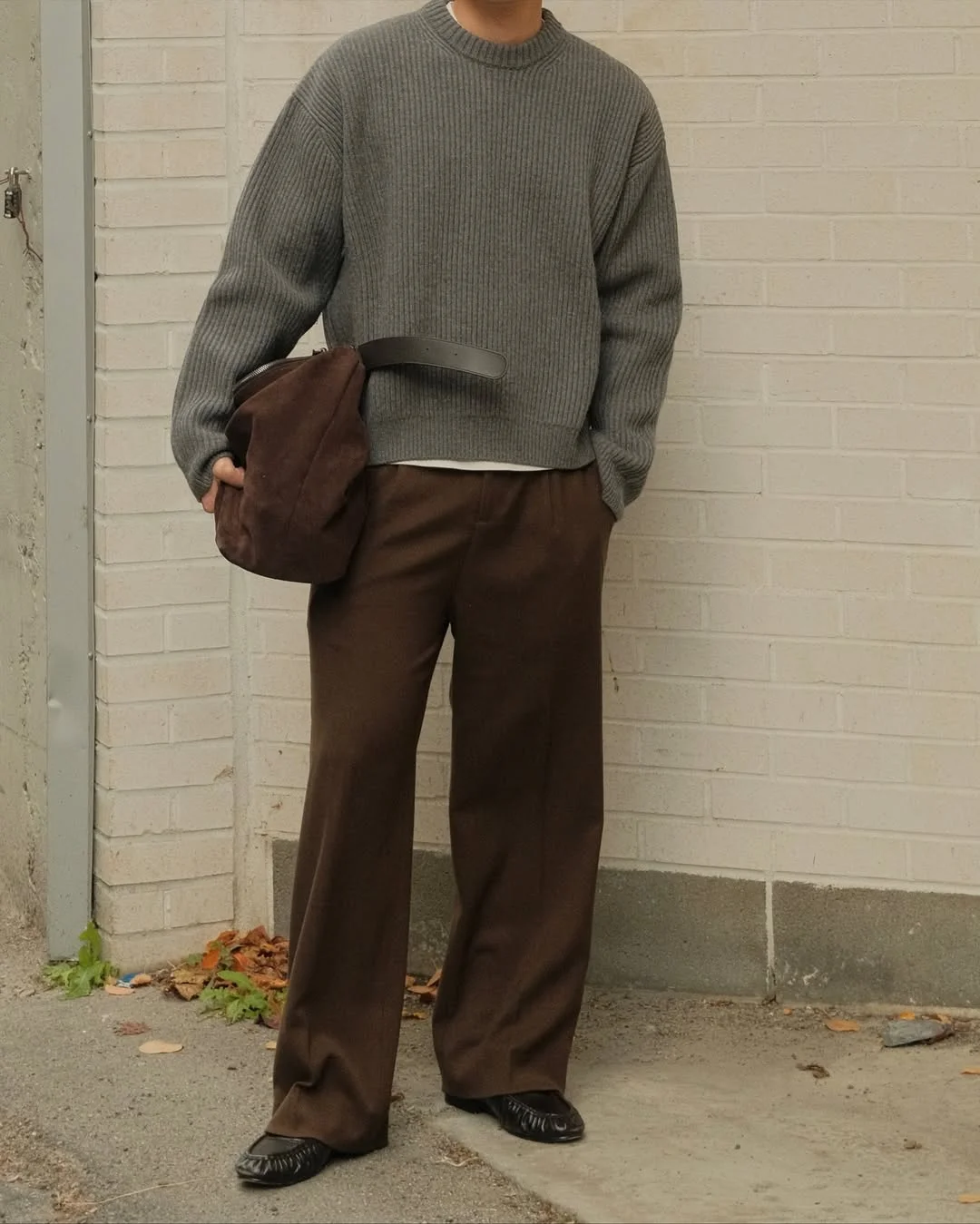 fall outfits ideas for men 2026 Oversized Knit And Wide-Leg Brown Trousers