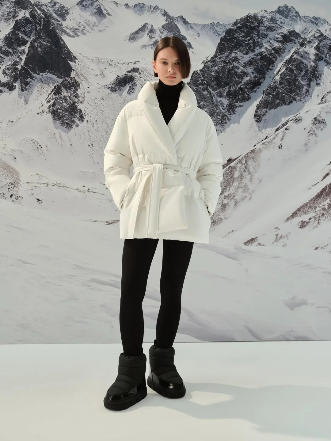 fall outfits with boots and leggings 2026 Minimalist White Puffer and Tall Winter Boots