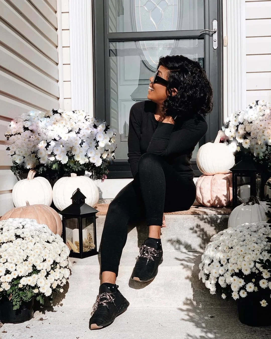 fall outfits with leggings and sneakers 2026 Minimal Black Outfit for Thanksgiving Weekend