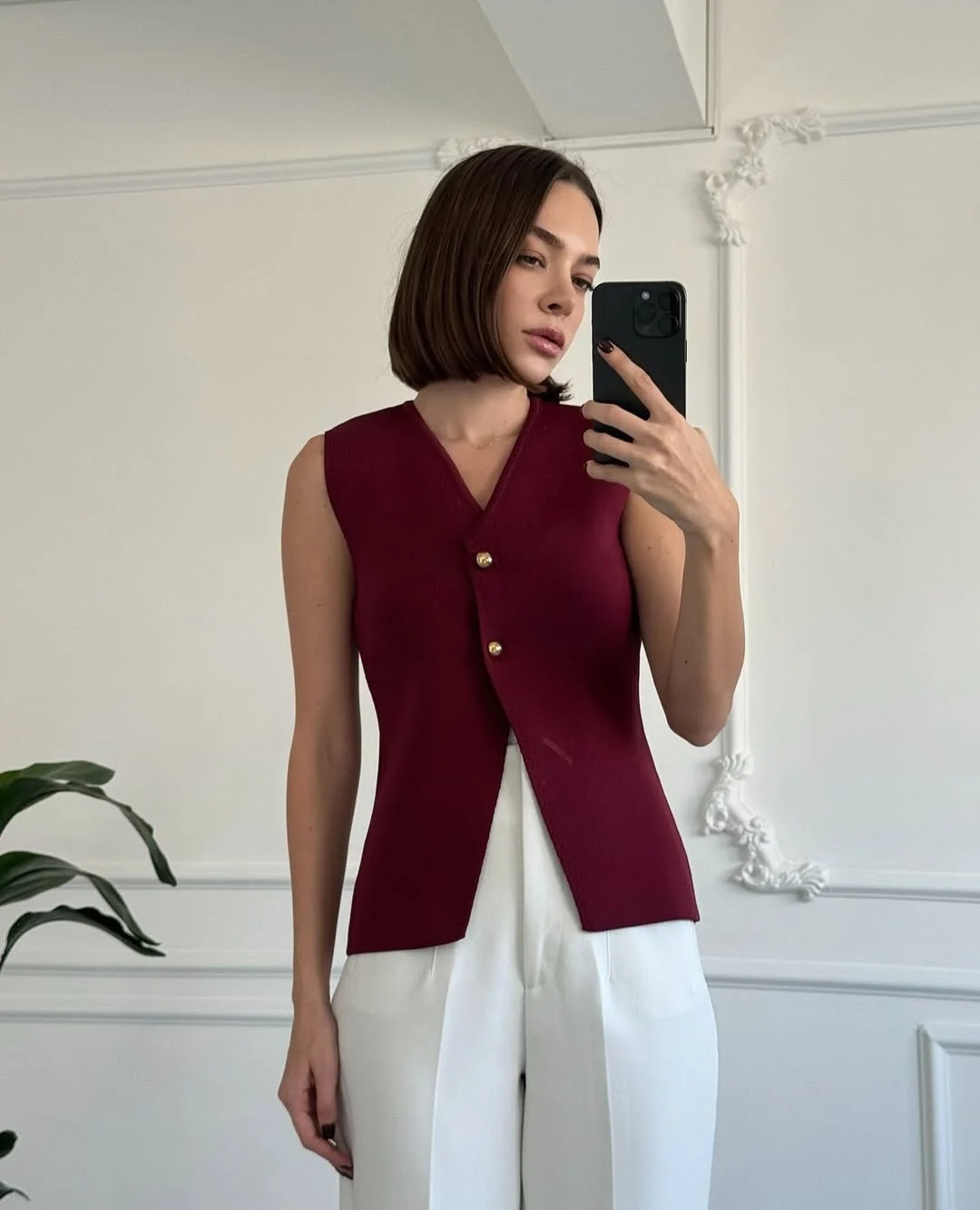 fall outfits with vests 2026 Burgundy Knit Vest and Tailored White Layers