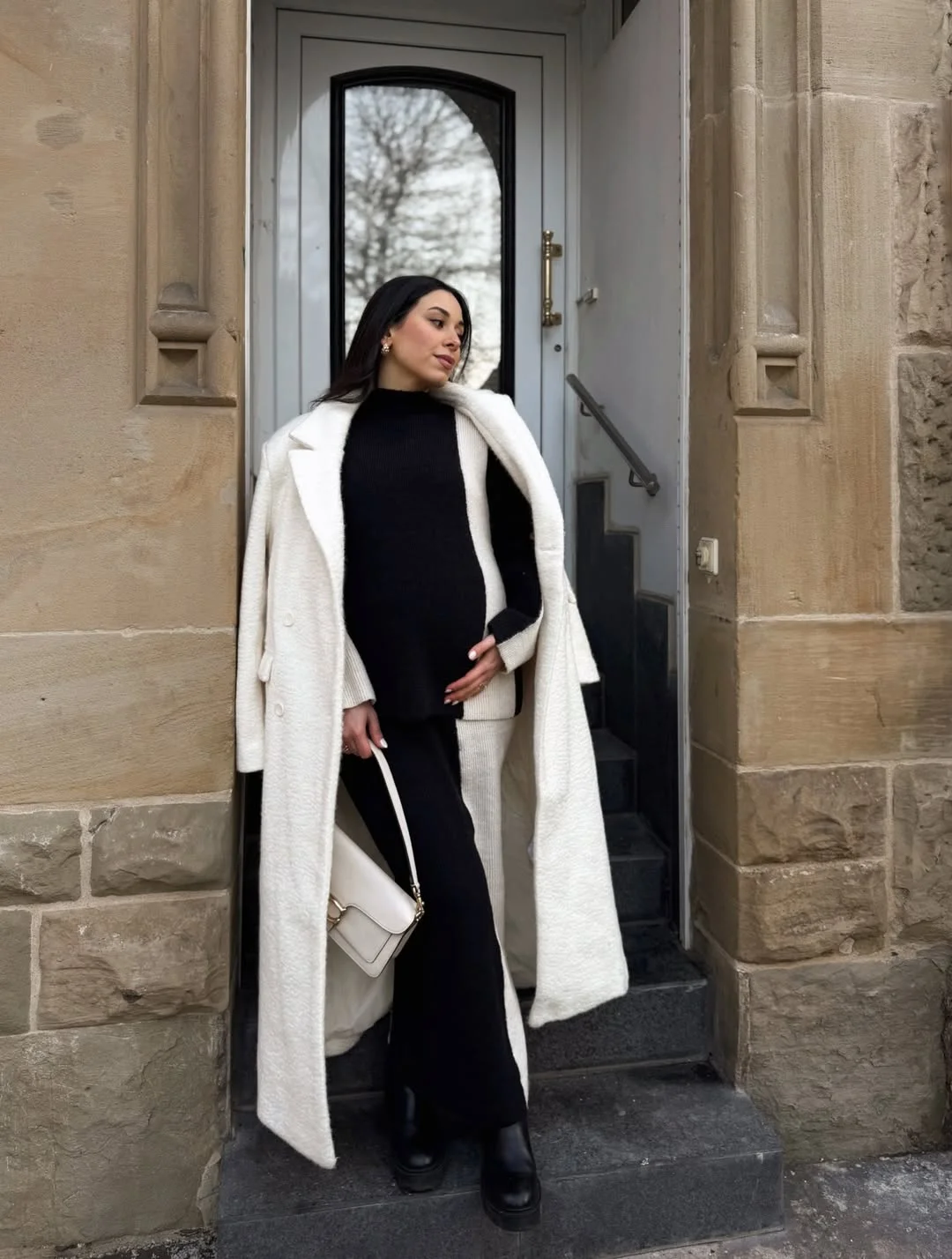 fall pregnancy outfits 2026 Black and Ivory Knit Layers for Chic Cold Days