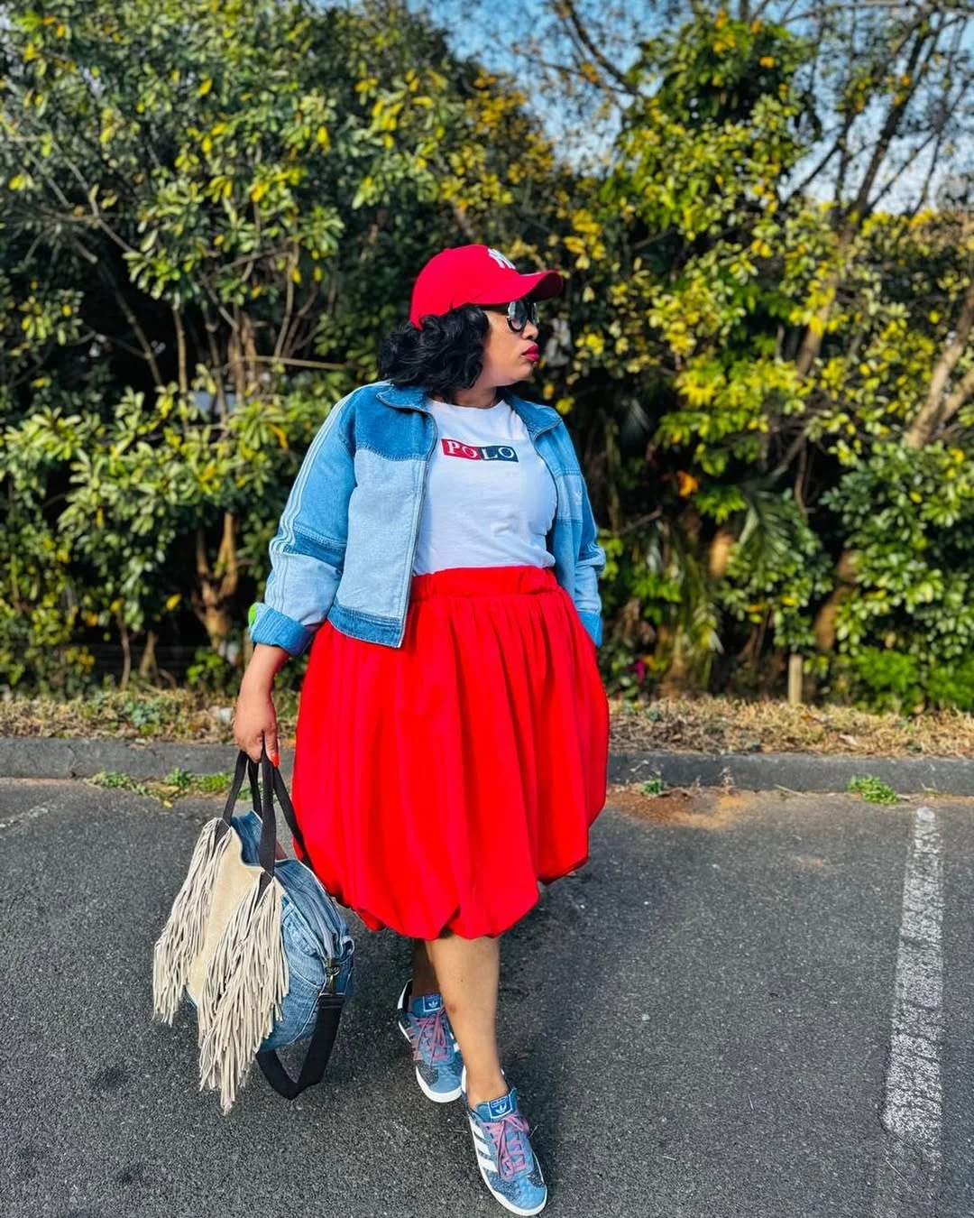 fall skirt and sneakers outfits 2026 Bold Red Skirt with Casual Denim Layers