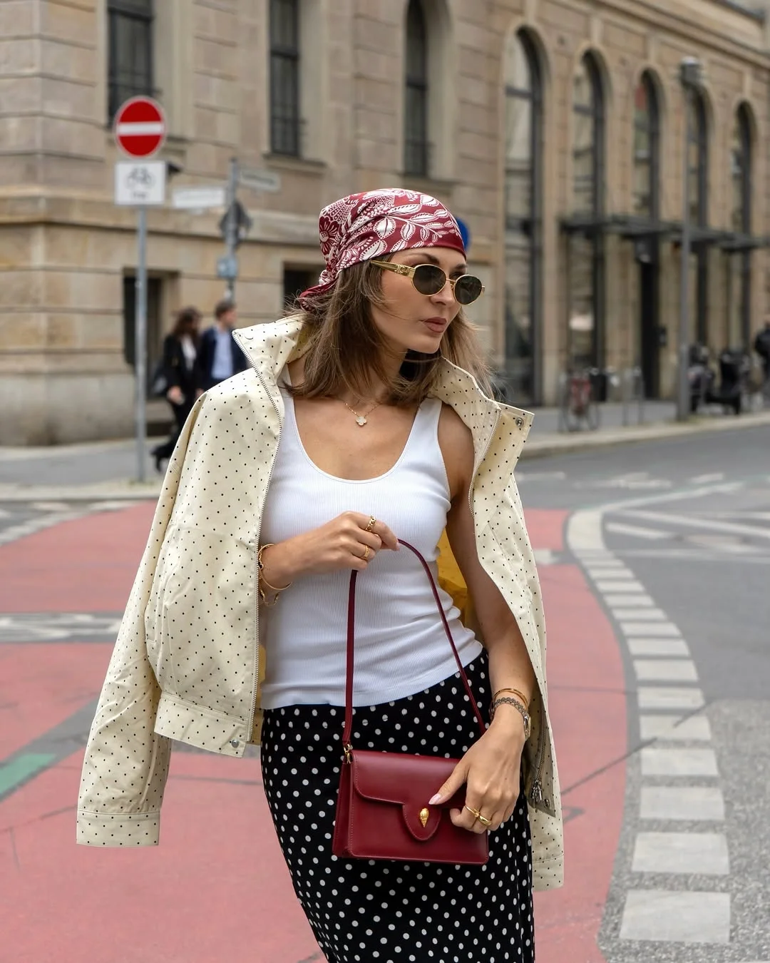 fall travel outfits 2026 Scarf And Polka Dot Street Style Combination
