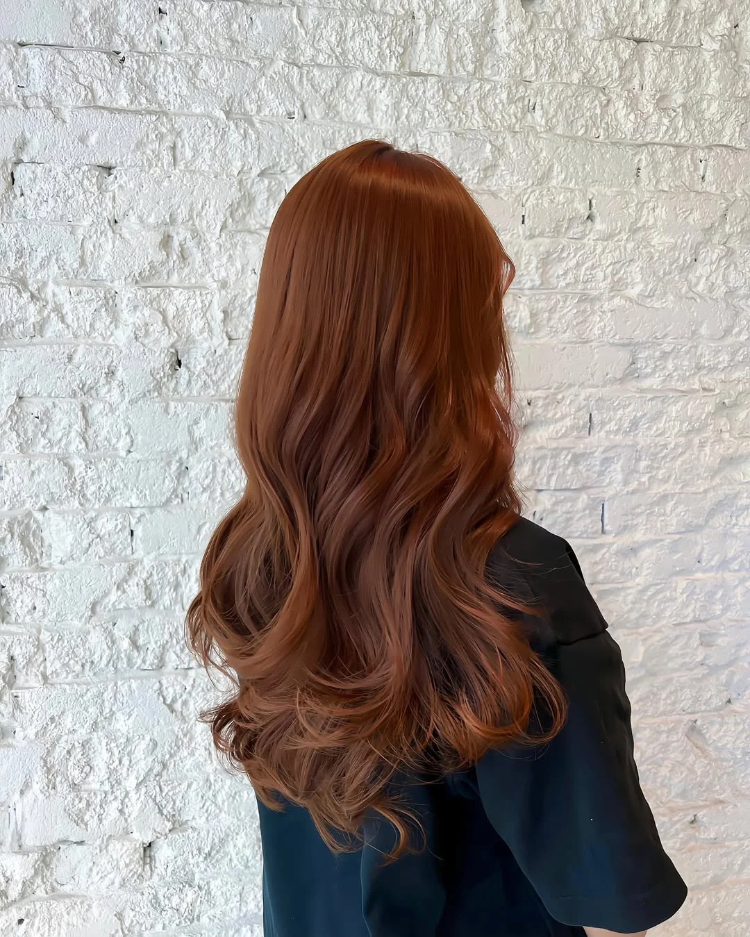 july hair colour ideas 2026 Glossy Cinnamon Silk Waves