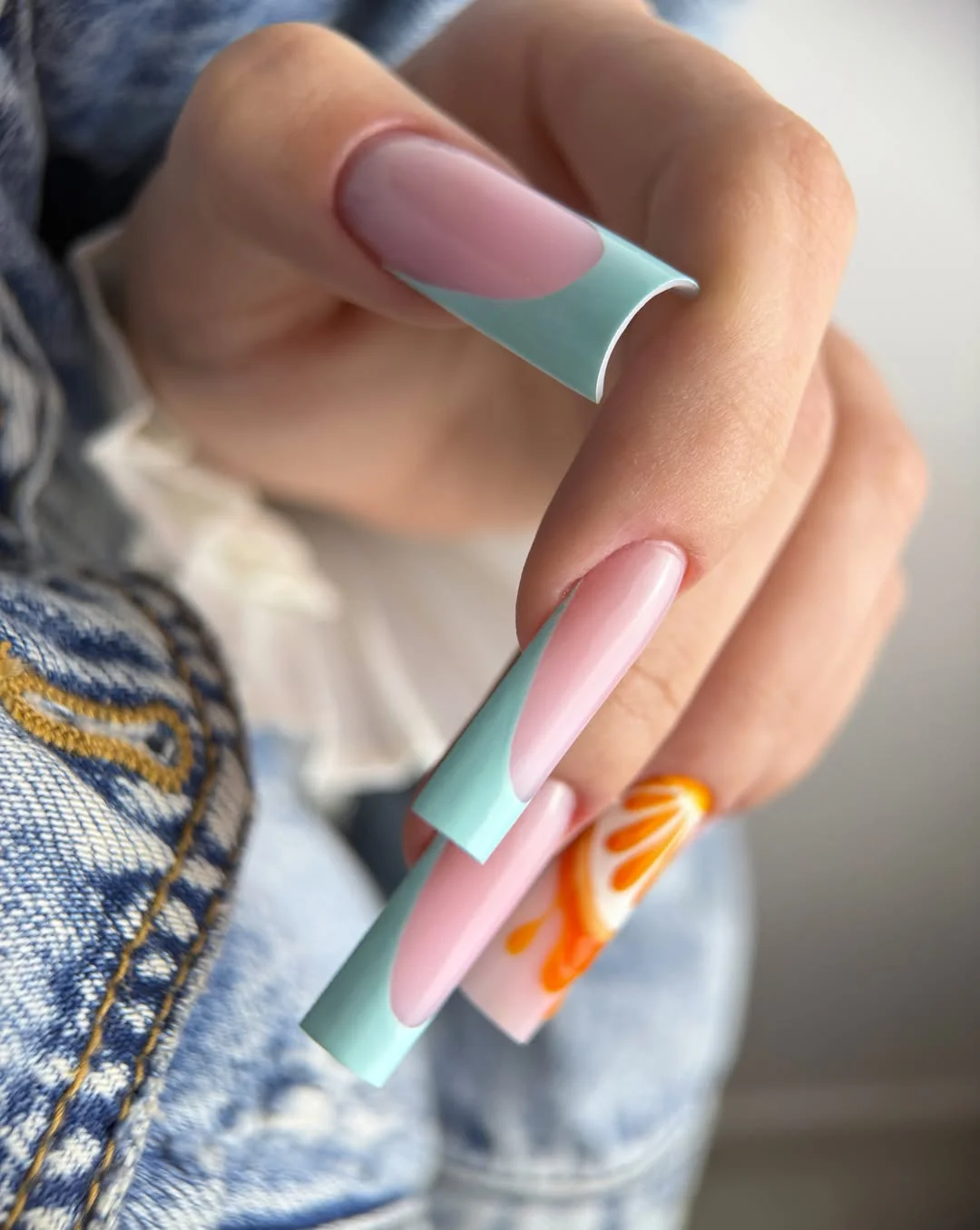 july nail colours ideas 2026 Pastel Mint French Tips with Citrus Art