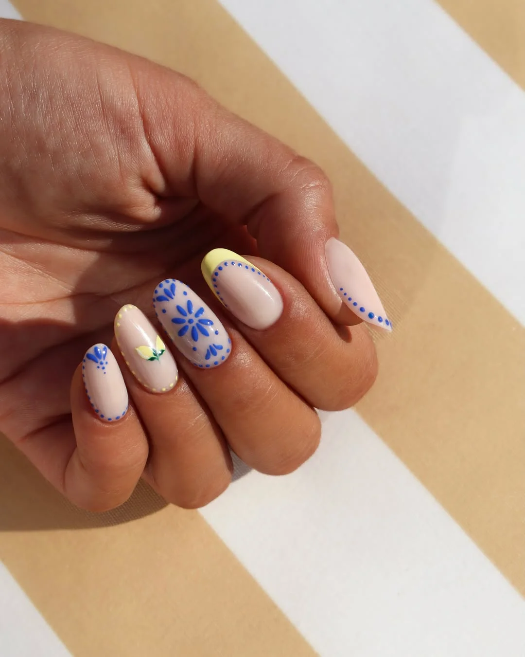 july nail colours ideas 2026 Blue Floral Dots with Lemon Accents