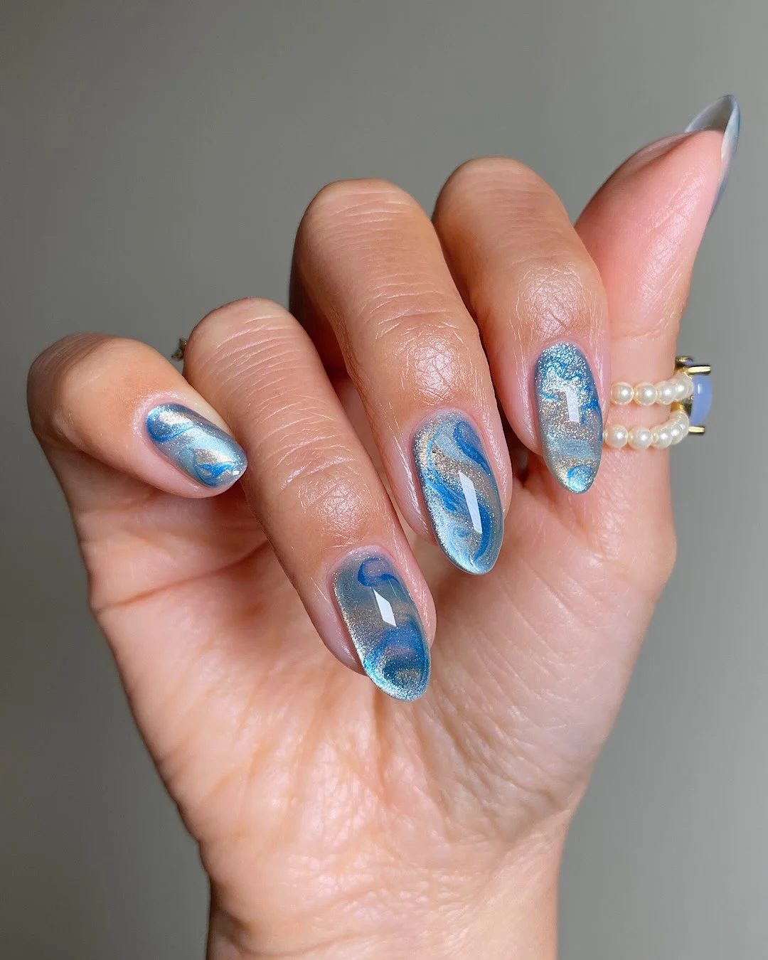 july nails design ideas 2026 Ocean-Inspired Chrome Waves for July