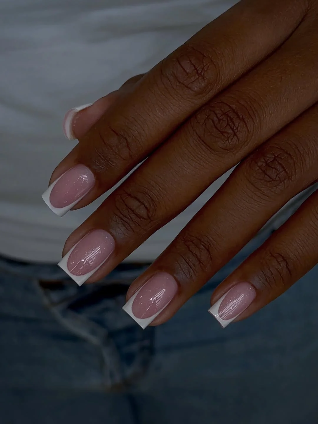 july nails design ideas 2026 Modern French Tips with Barely-There Sparkle